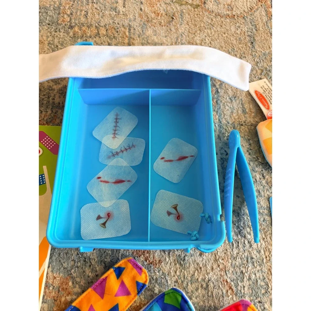 Melissa & Doug Boo-Boos & Bandages Reusable First Aid Pretend Play Set Kids Toy